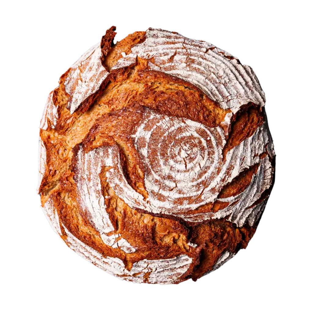 Ein runder Brotlaib der Bäckerei Wiesender mit goldbrauner Kruste und rustikaler Mehlspirale auf der Oberseite, dargestellt auf weißem Hintergrund. Ein echter Geschmack von Pfaffenhofener und Freisinger Tradition.