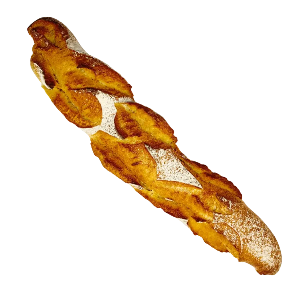 Ein knuspriges, goldbraunes Baguette aus der Naturbackstube der Bäckerei Wiesender in Moosburg, mit Mehl bestäubt.